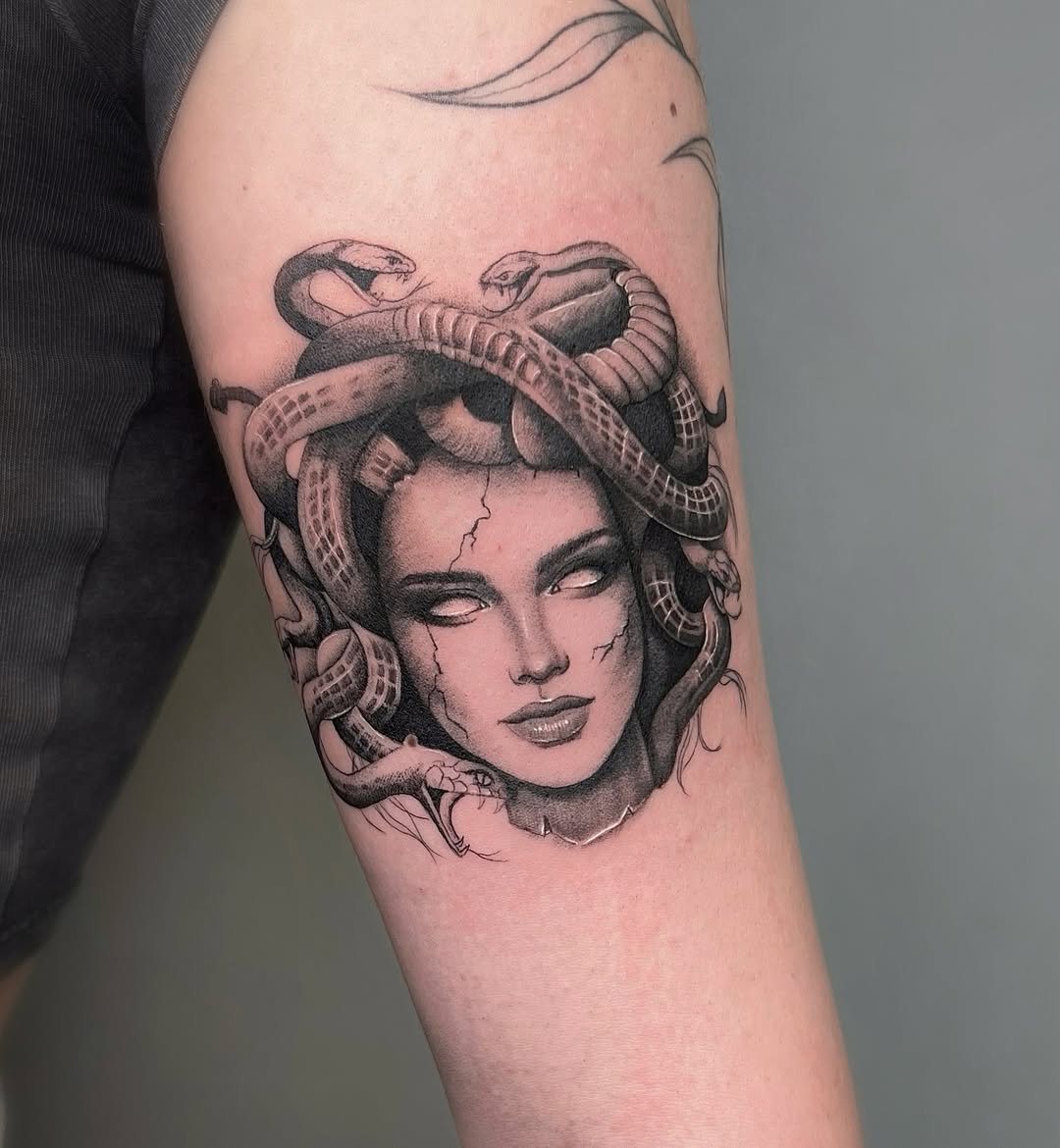 Fierce Medusa Tattoo with Snakes and Detail Tattoo on skin