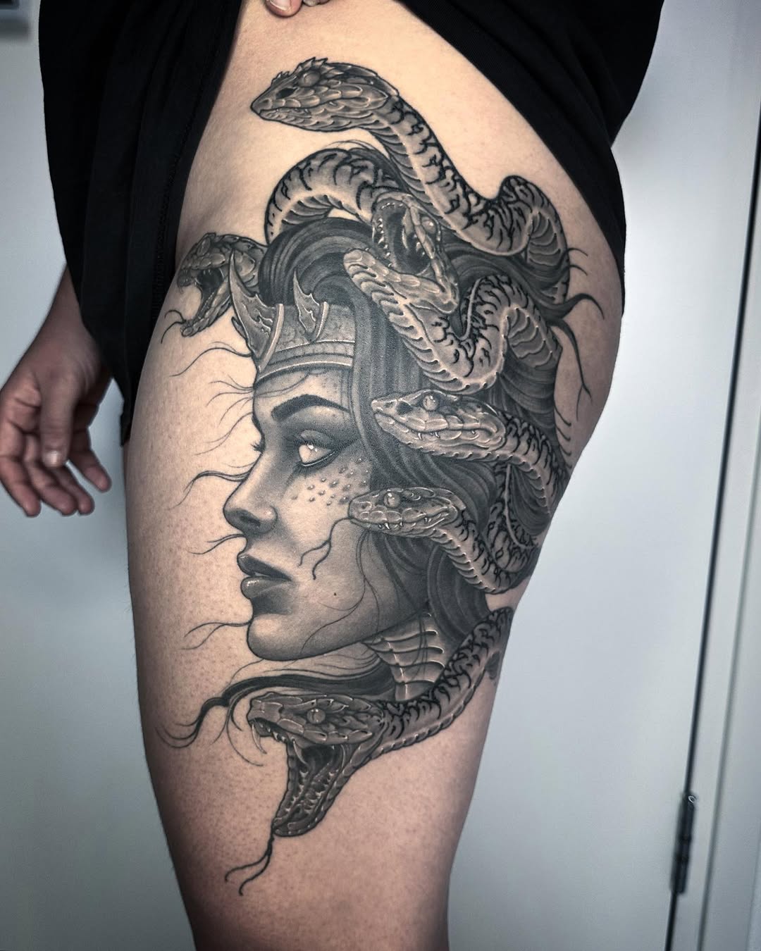 Intricate Medusa Tattoo with Fierce Snake Design Tattoo on skin