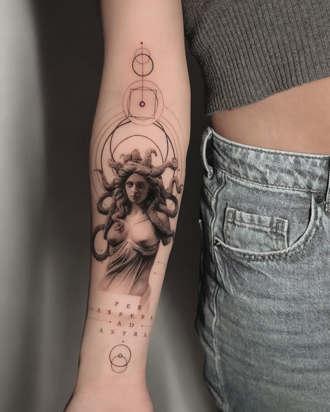 Intricate Medusa Tattoo with Geometric Flair Tattoo on skin