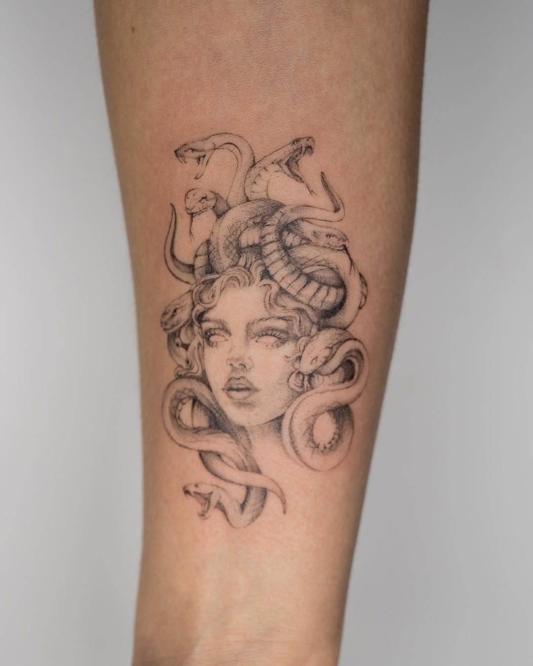 Intricate Medusa Tattoo with Serpentine Elegance Tattoo on skin