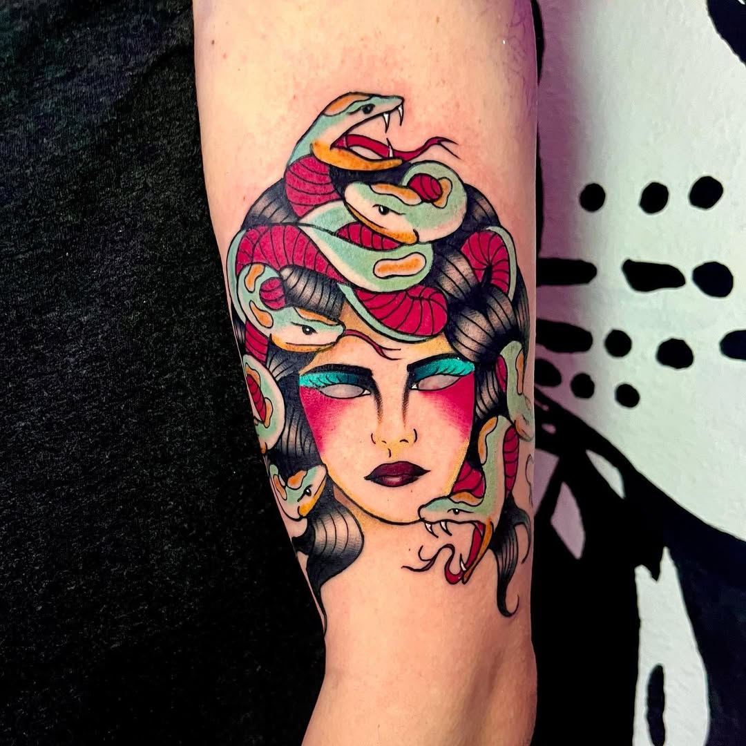 Striking Medusa Tattoo with Colorful Snakes Tattoo on skin