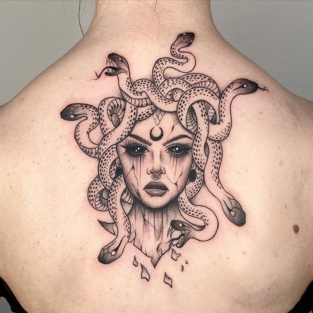 Striking Medusa Tattoo with Detailed Snakes Tattoo on skin
