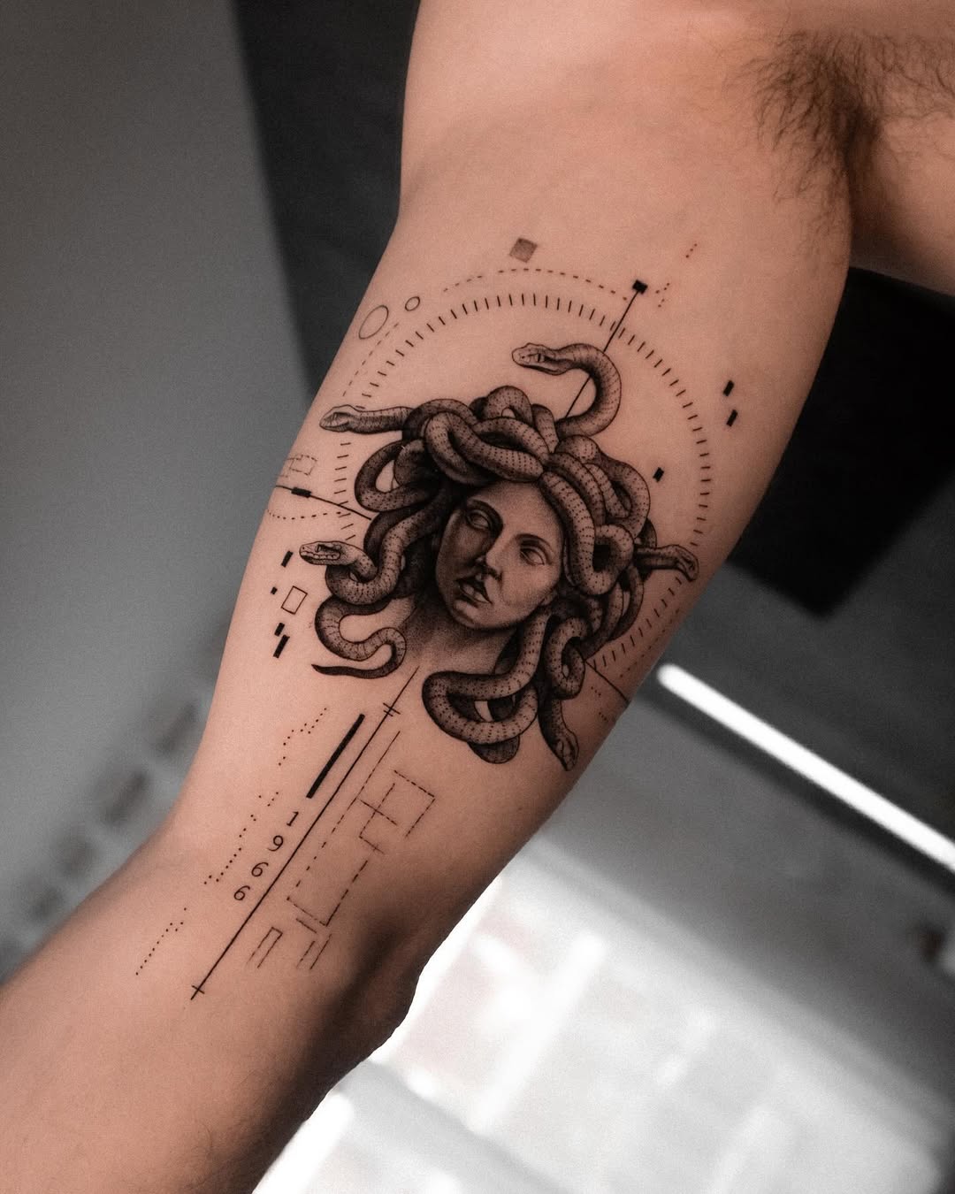 Striking Medusa Tattoo with Modern Elements Tattoo on skin