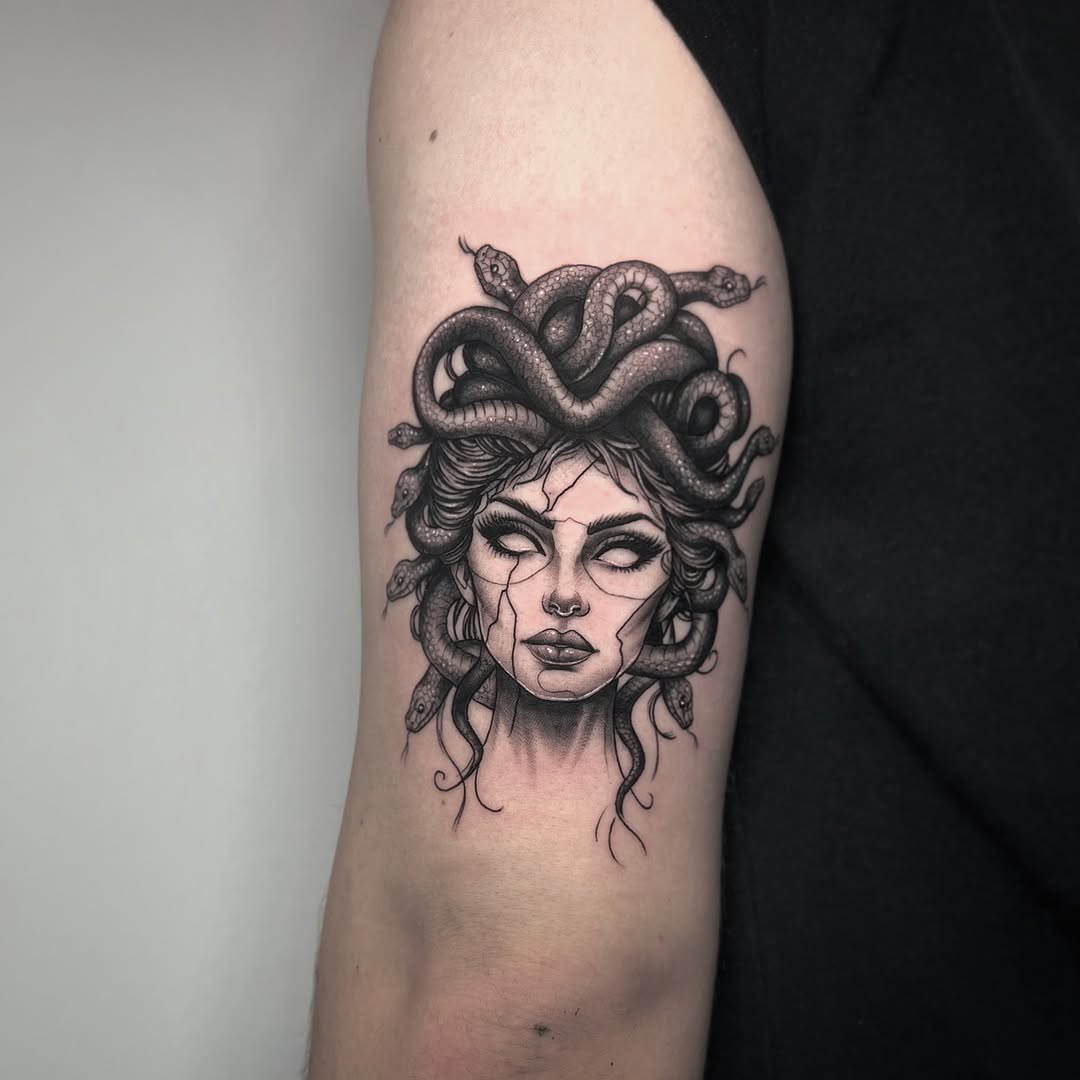 Striking Medusa Tattoo with Serpent Details Tattoo on skin