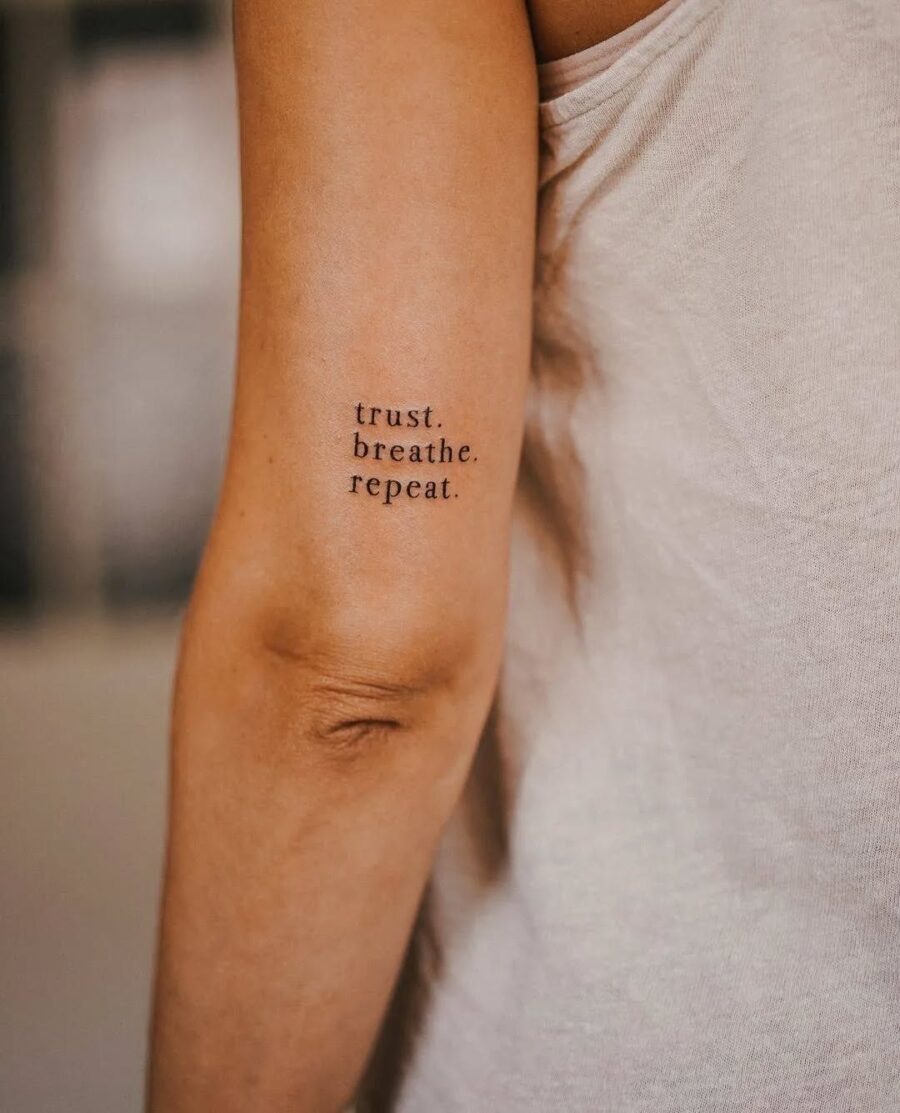 Affirmative phrases promoting mindfulness and relaxation Tattoo on skin
