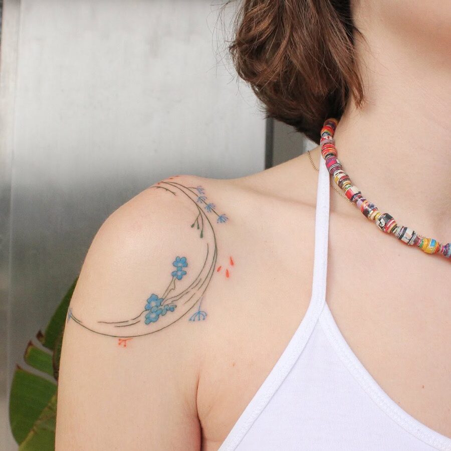 Delicate flower tattoo symbolizes mindfulness and growth Tattoo on skin