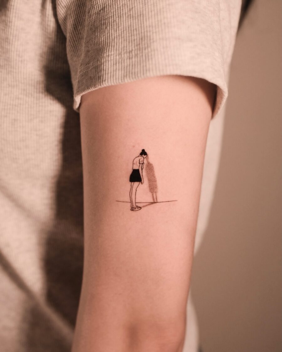 Elegant tattoo embodying quiet reflection and mindfulness Tattoo on skin
