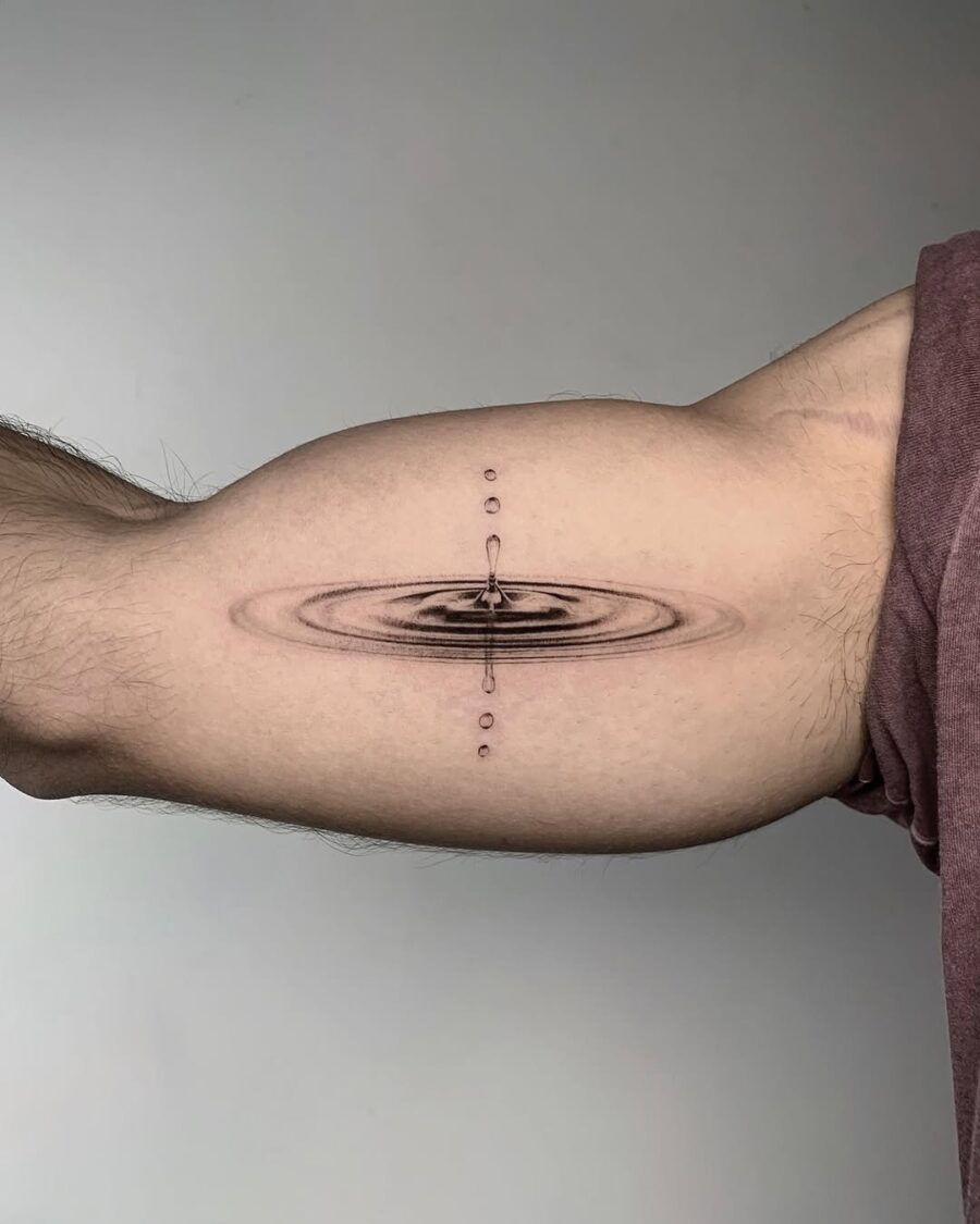 Symbolic water drop tattoo for mindfulness Tattoo on skin