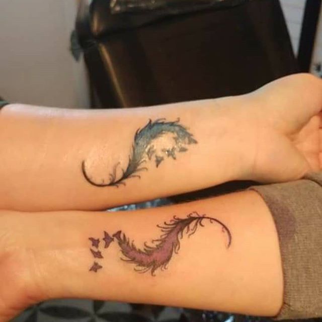 Coordinating Feather with Birds Tattoos Tattoo on skin