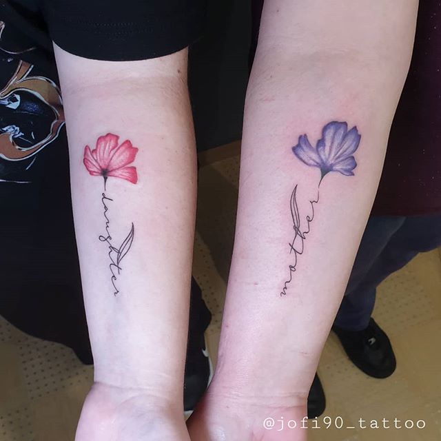 Mother and Daughter Coordinating Flower Tattoos Tattoo on skin