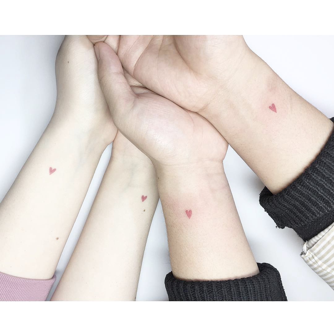 Simply Small Pink Heart Wrist Tattoo Tattoo on skin