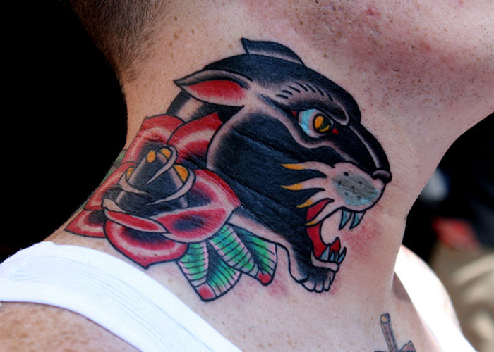 Black Panther and Red Rose Neck Tattoo Tattoo on skin