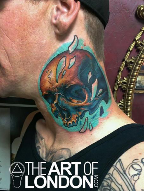 Blue Sets This Skull Apart on the Neck Tattoo Tattoo on skin