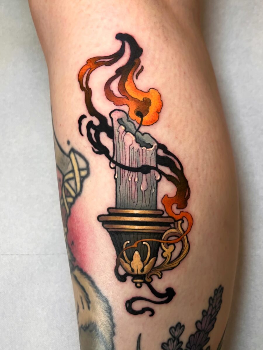 Bold candle tattoo with vibrant flame details Tattoo on skin