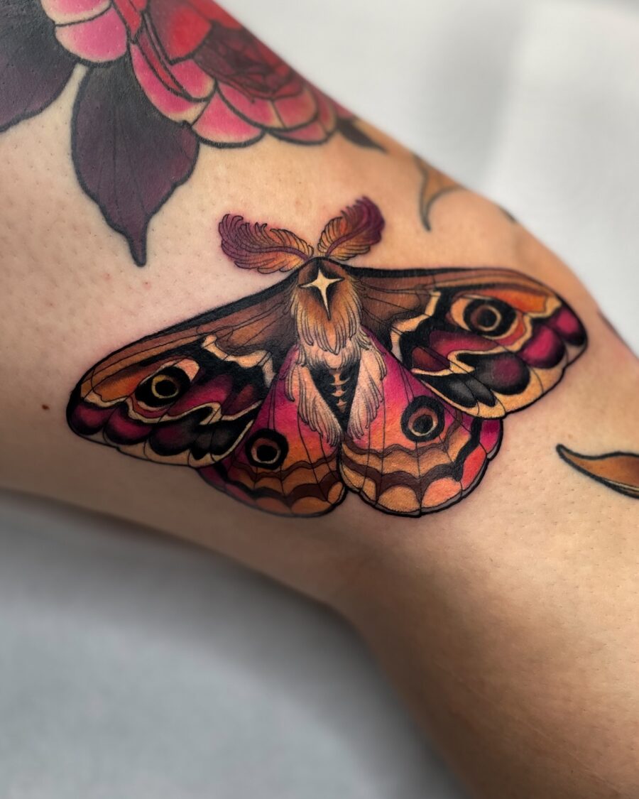 Striking neo-traditional moth tattoo design Tattoo on skin