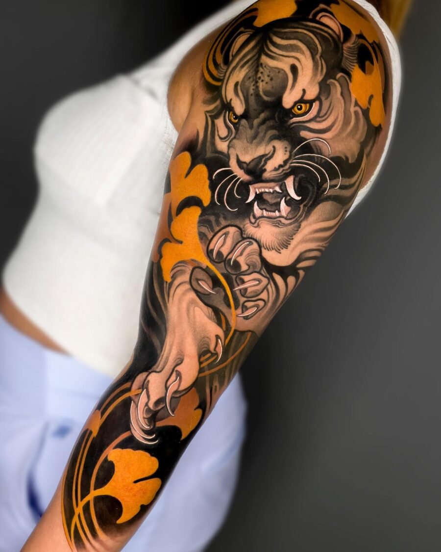 Striking neo-traditional tiger arm tattoo design neo traditional tattoos