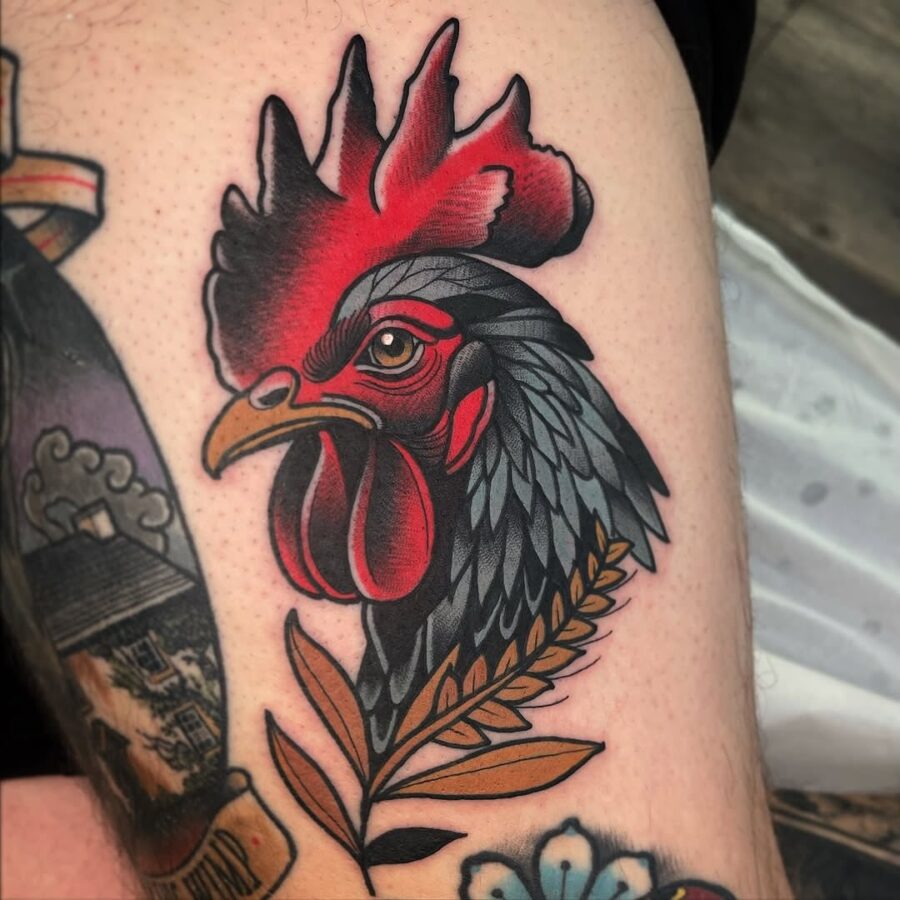 Vibrant rooster design showcasing bold traditional elements Tattoo on skin