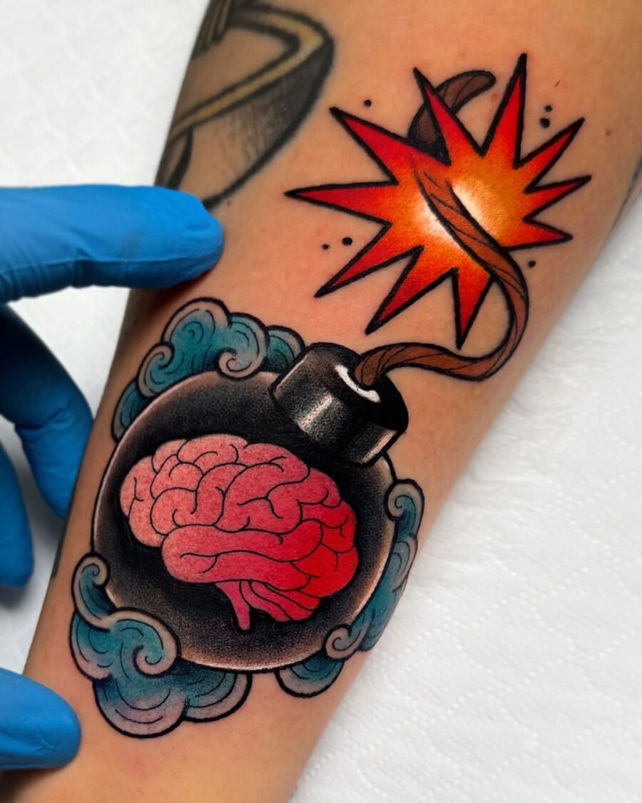 Bold brain bomb tattoo with explosive vibes Tattoo on skin