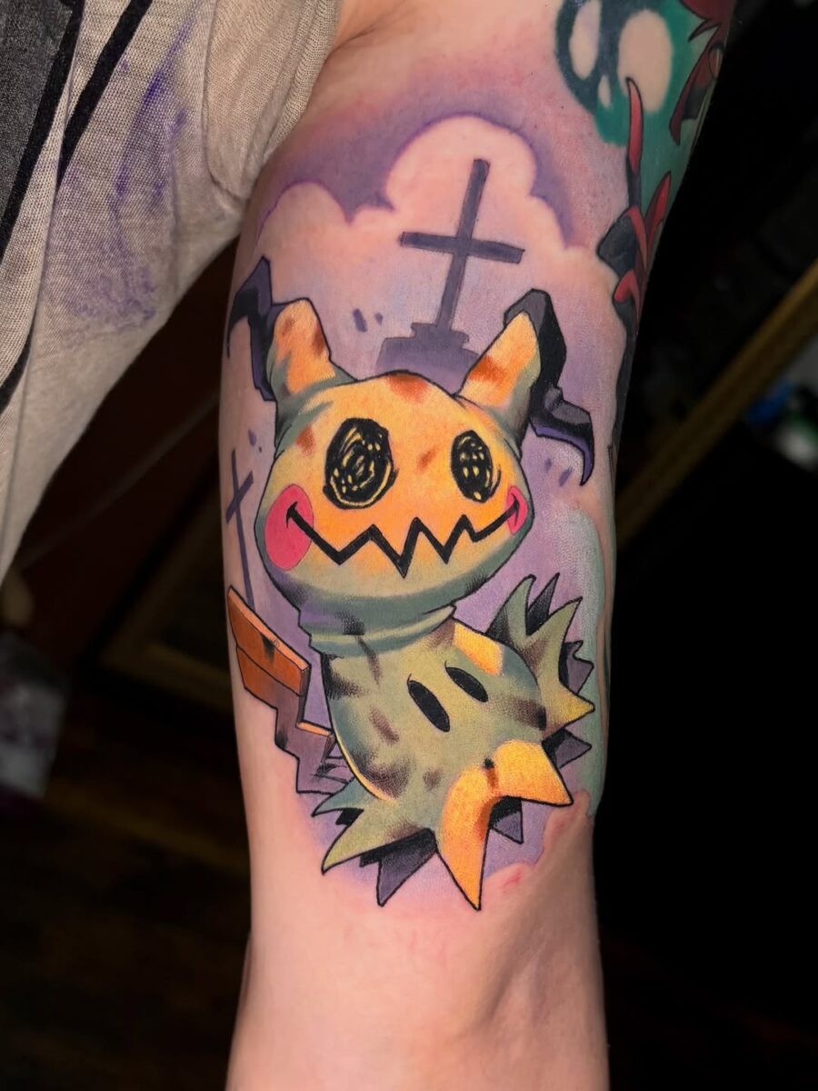 Colorful Mimikyu Tattoo with Playful Vibes Tattoo on skin