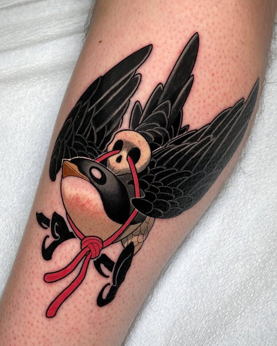 Colorful new school swallow tattoo with dynamic wings Tattoo on skin