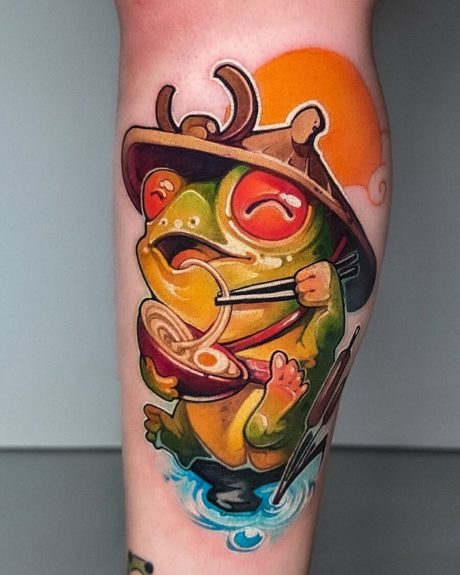 Playful frog enjoying a delicious bowl of ramen Tattoo on skin
