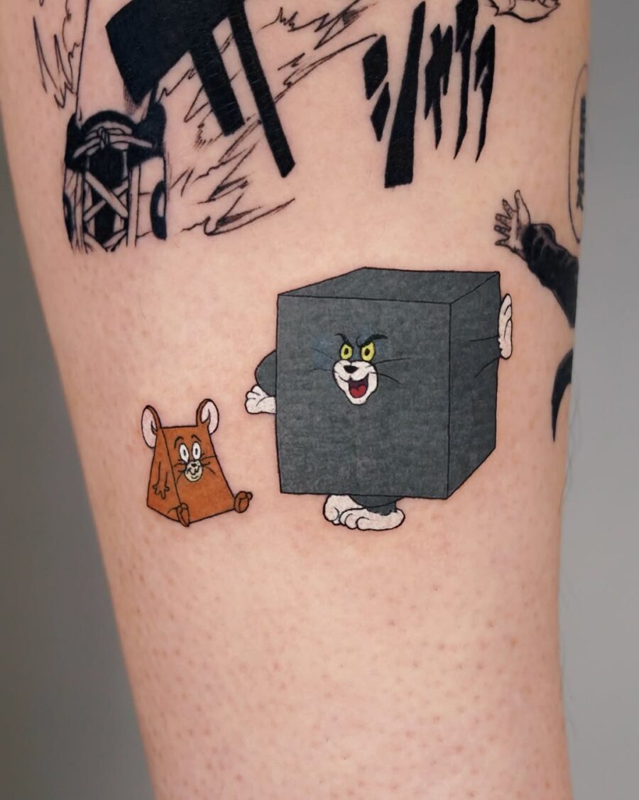 Playful Tom and Jerry tattoo captures cartoon spirit Tattoo on skin