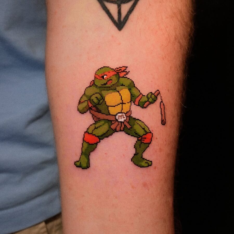 Retro pixel art tattoo of Raphael Tattoo on skin