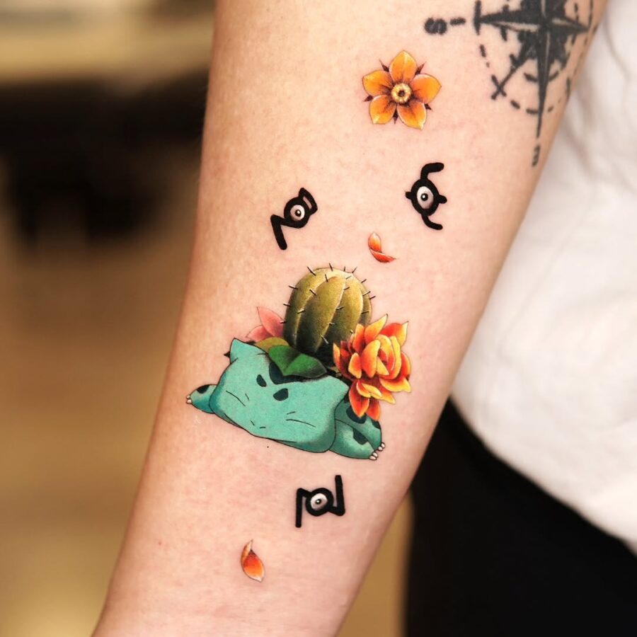 Vibrant artwork featuring a Bulbasaur tattoo Tattoo on skin