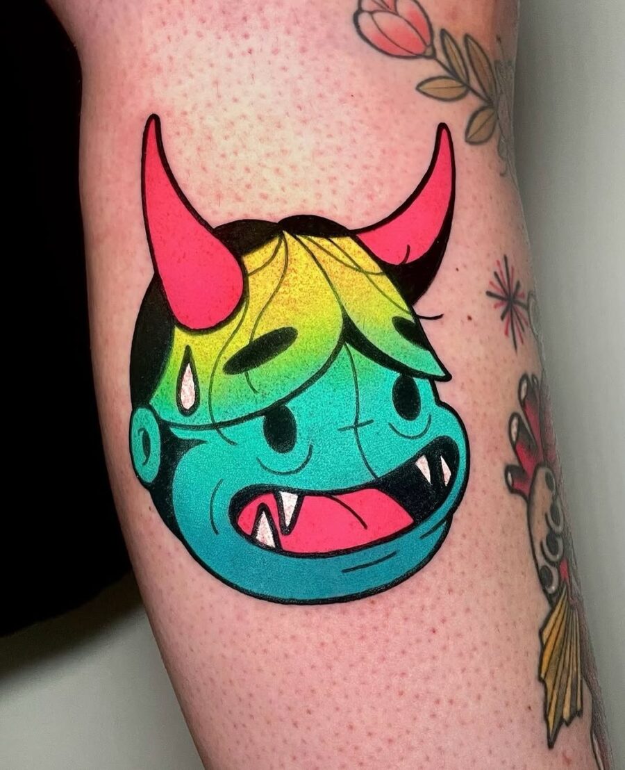 Vibrant cartoon monster tattoo with playful vibes Tattoo on skin