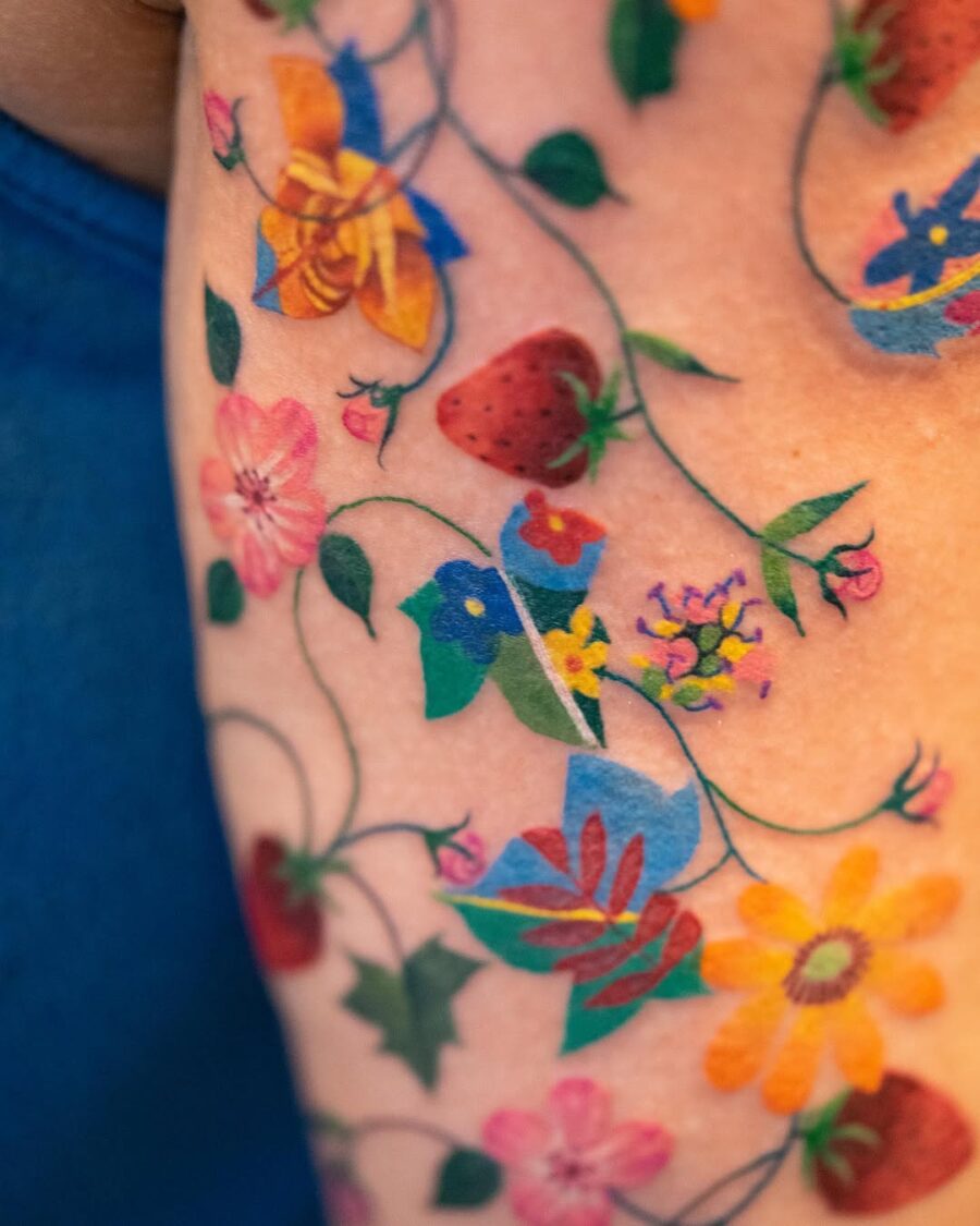 Vibrant floral designs in new school tattoos Tattoo on skin