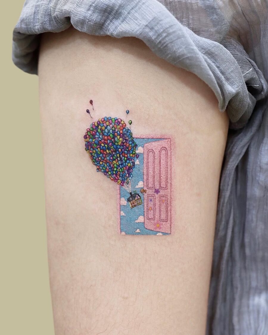 Whimsical door with colorful balloon escape Tattoo on skin