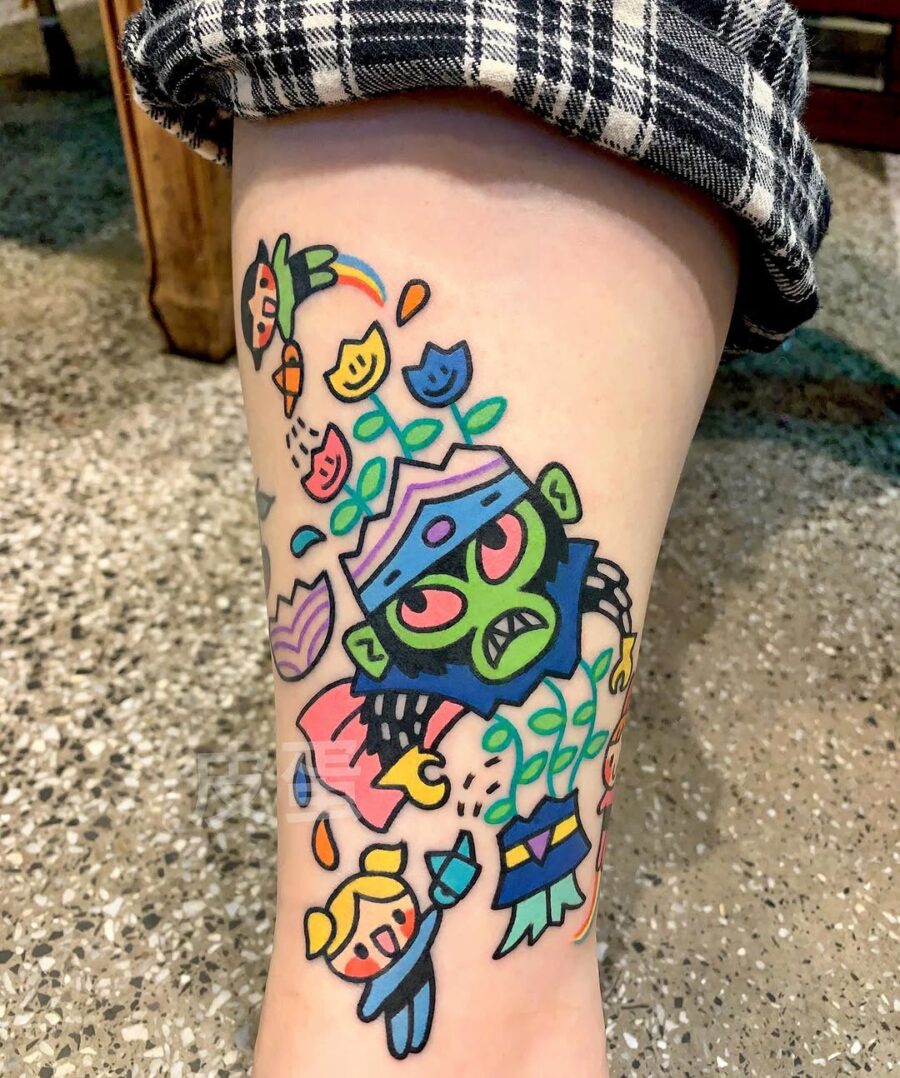 Whimsical new school tattoo featuring unique characters Tattoo on skin