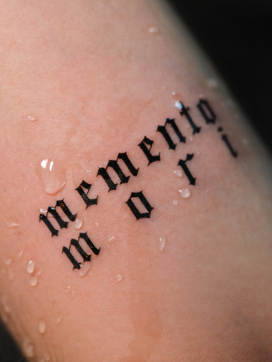 A Reminder of Mortality Tattoo on skin