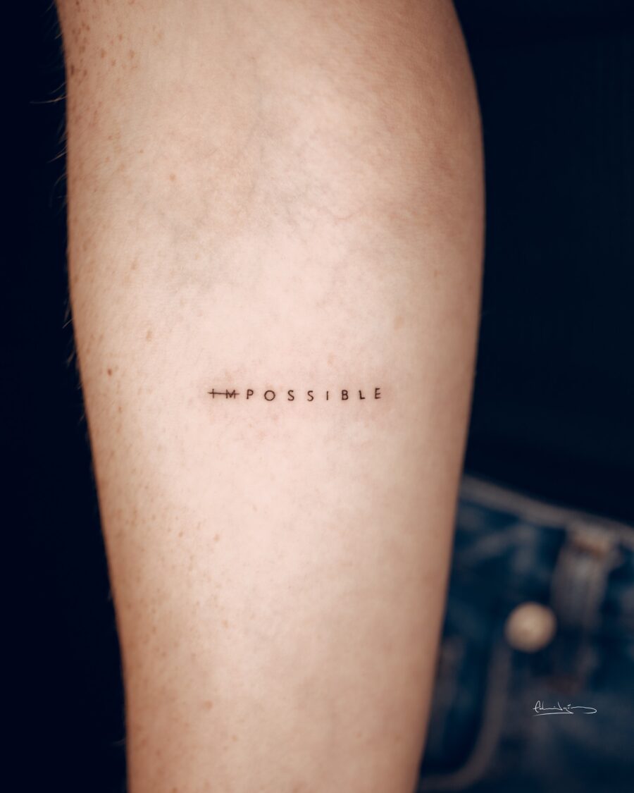 Minimalist tattoo embodying resilience and determination Tattoo on skin