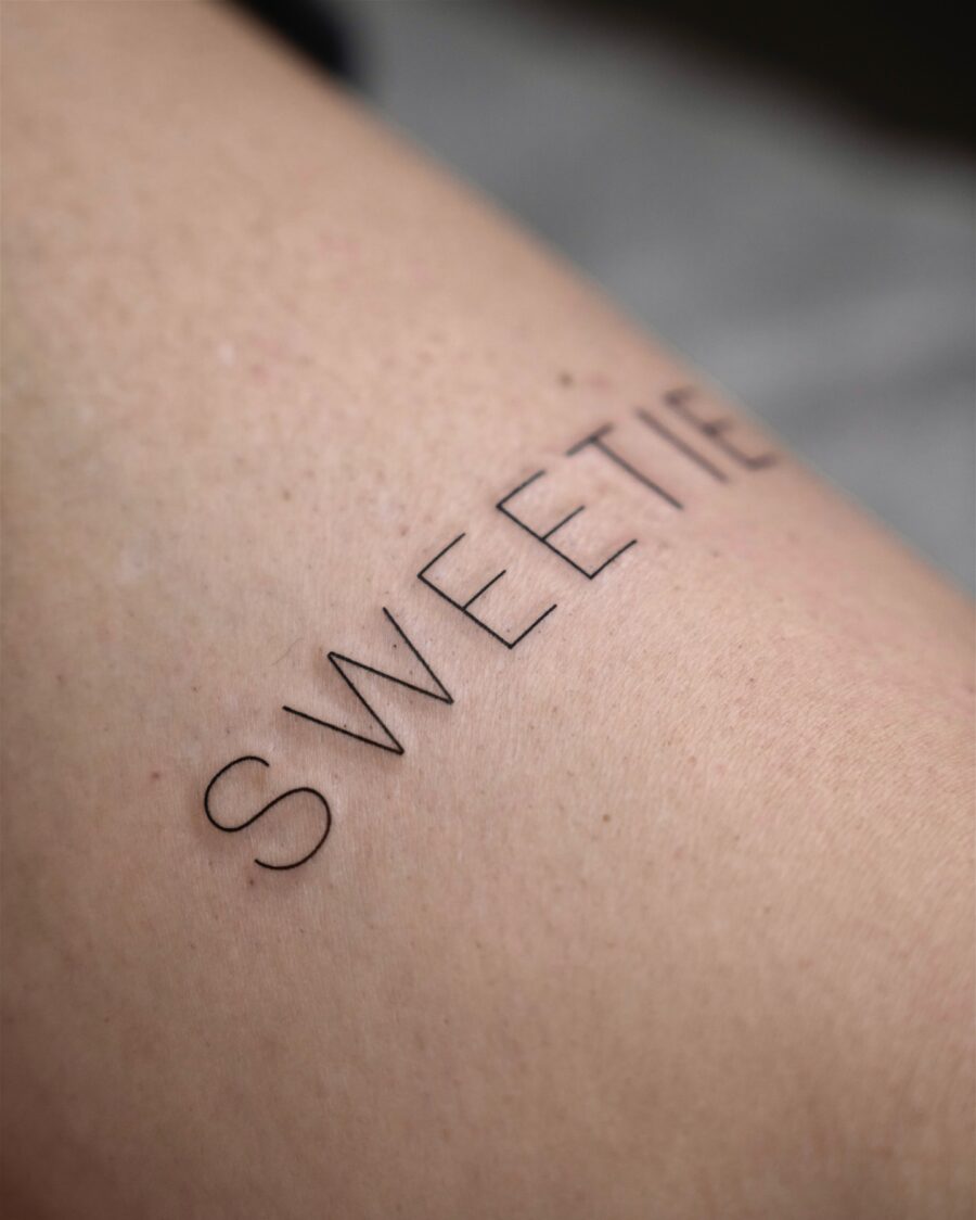 Minimalist tattoo showcasing a sweet sentiment Tattoo on skin