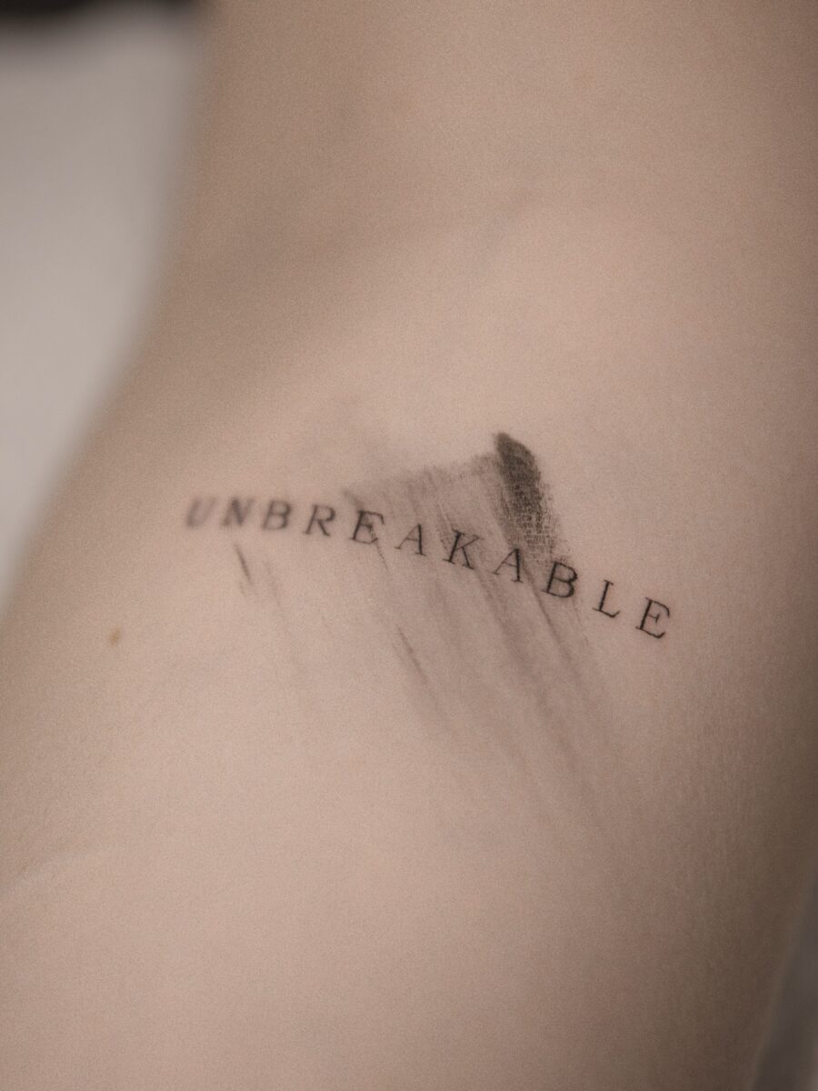 Minimalist tattoo with a powerful message. Tattoo on skin