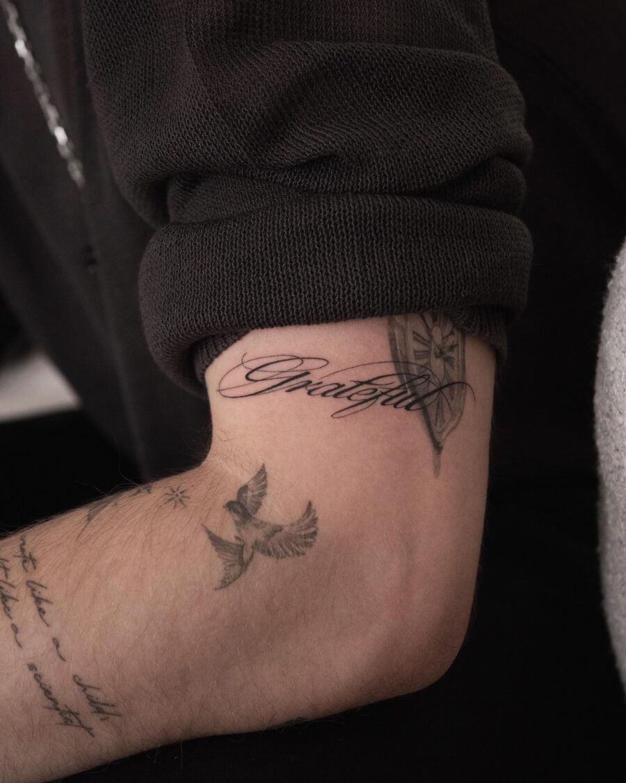 Stylish tribute to grateful living in ink Tattoo on skin