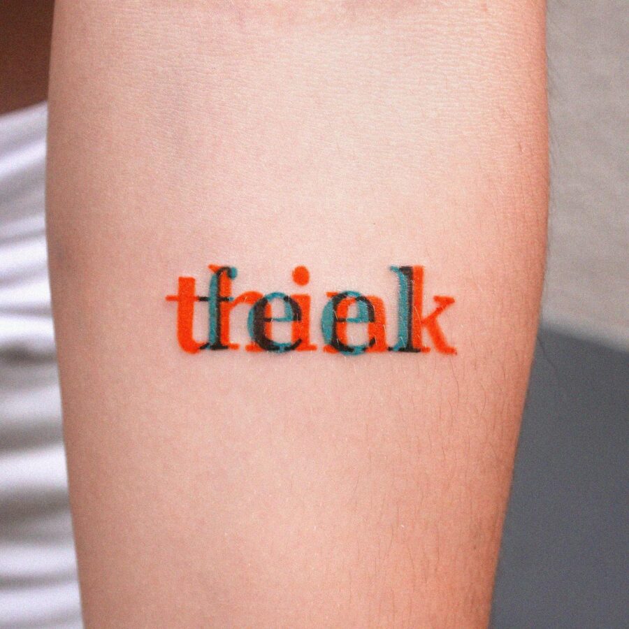 Unique One-Word Tattoo: Freek in Color Tattoo on skin