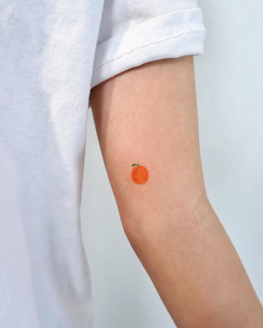 Charming Minimalist Orange Tattoo Design Tattoo on skin