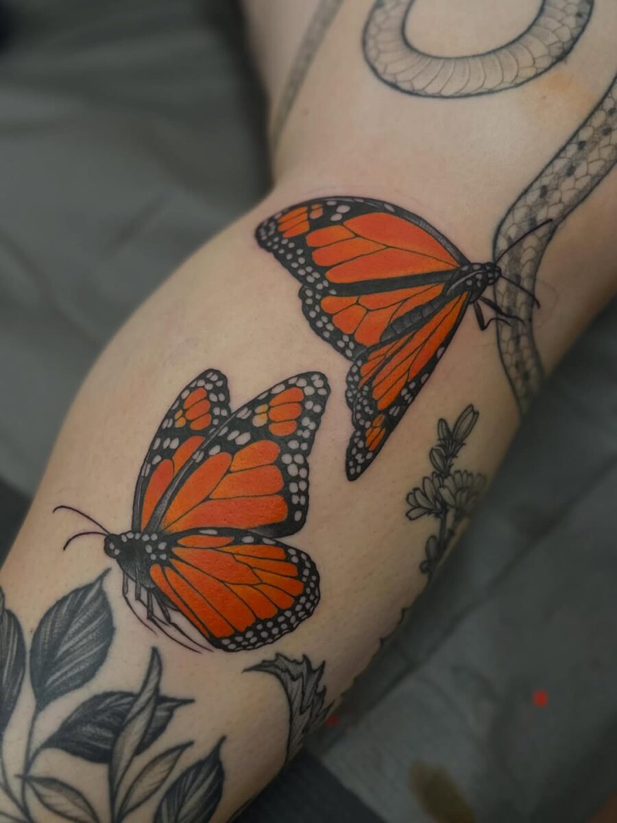 Vibrant orange butterfly tattoos for bold expressions Tattoo on skin