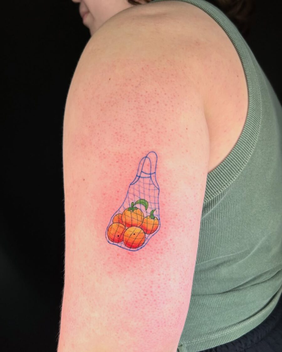Vibrant orange tattoos in a unique design Tattoo on skin