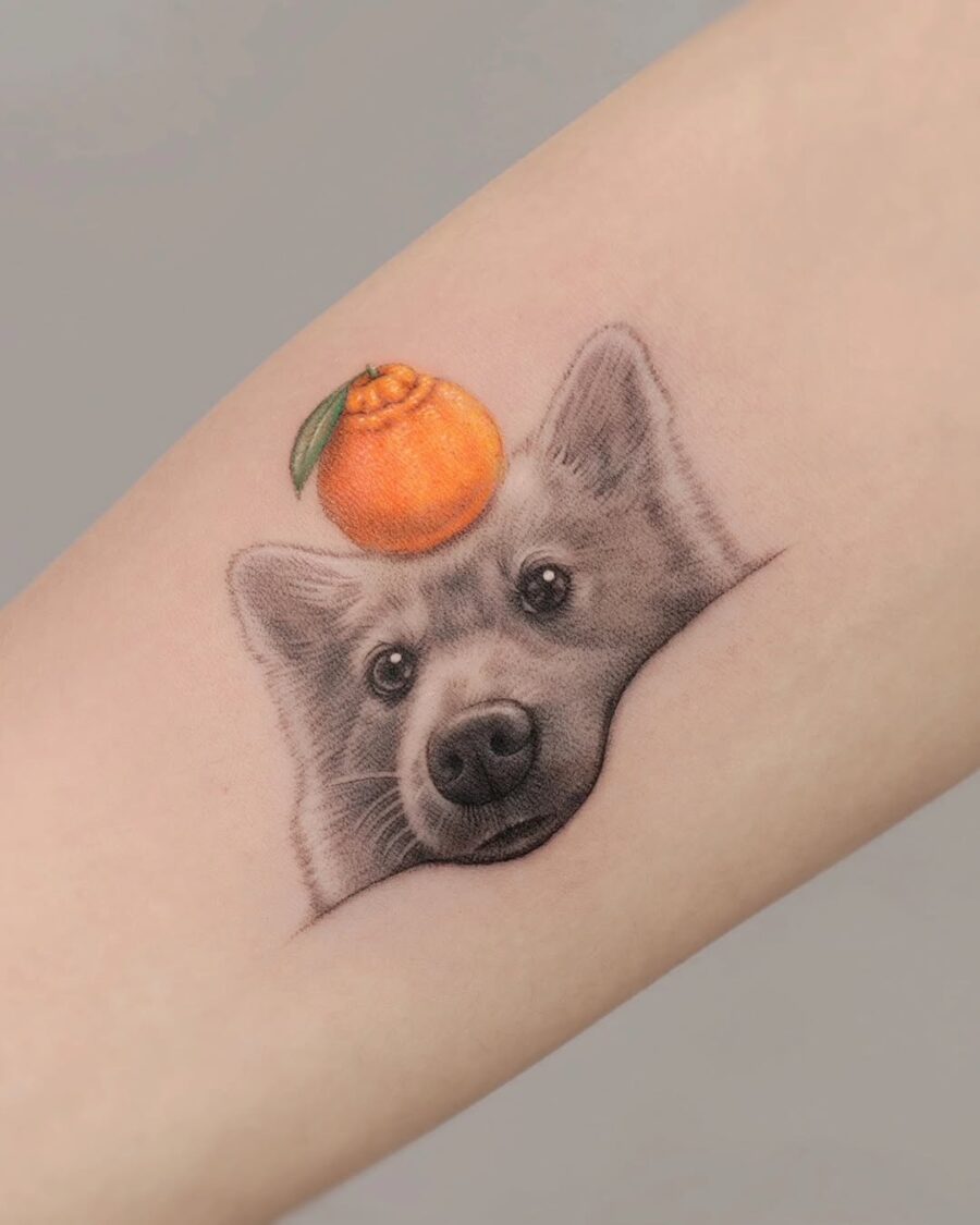 Whimsical wolf tattoo with an orange twist Tattoo on skin