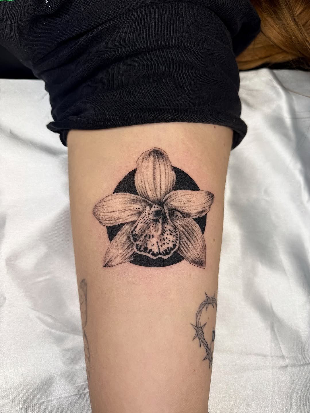 Elegant black and gray orchid tattoo design Tattoo on skin