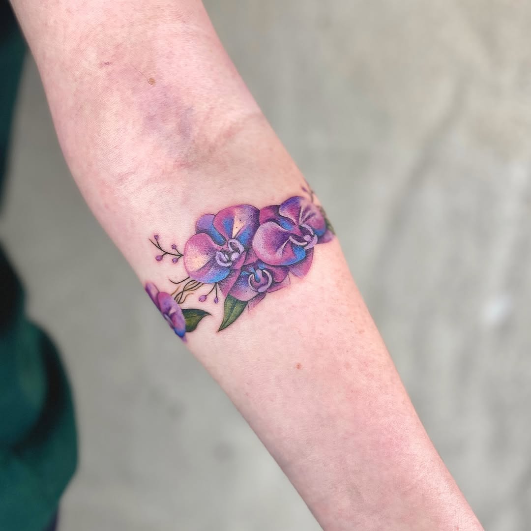 Stunning vibrant purple orchid tattoo design Tattoo on skin