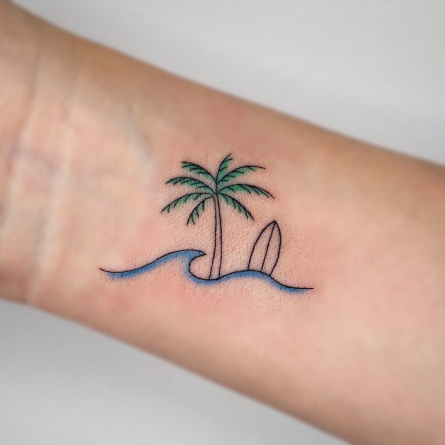 Charming minimalistic palm tree tattoo design Tattoo on skin