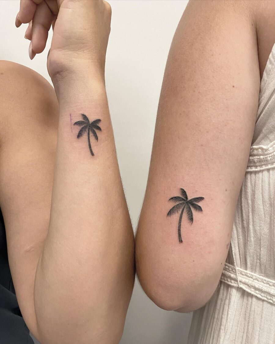 Elegant palm tree tattoos for a tropical vibe. Tattoo on skin