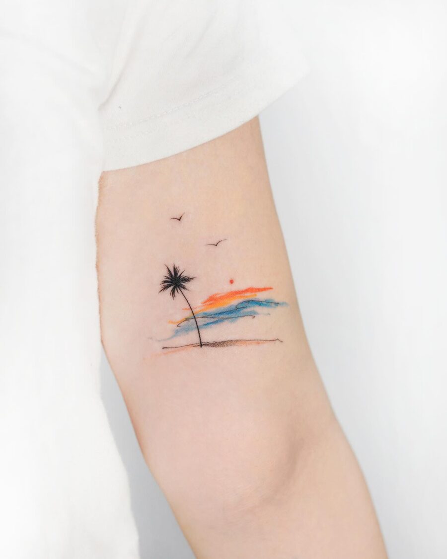 Minimalist palm tree tattoo with sunset vibes Tattoo on skin