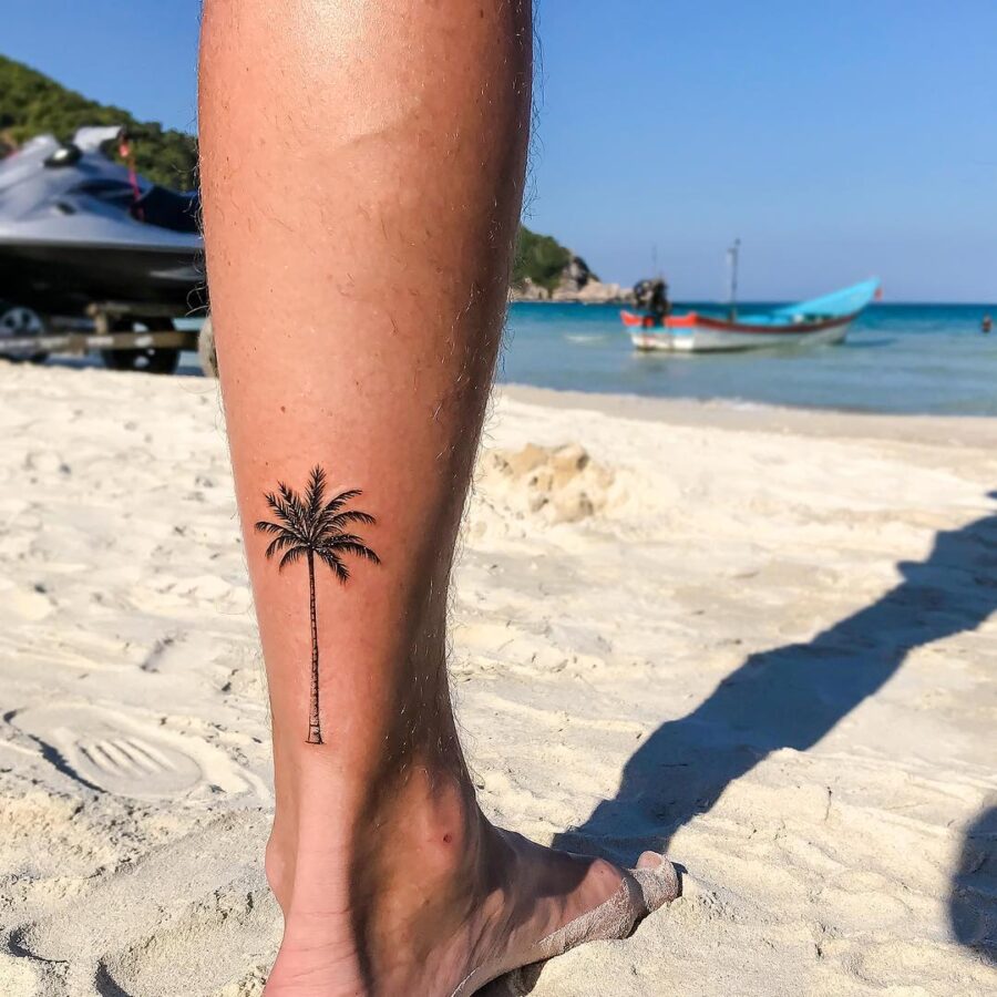 Stylish palm tree tattoo on the leg palm tree tattoos