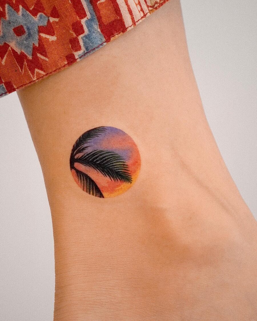 Vibrant sunset palm tree tattoo design Tattoo on skin