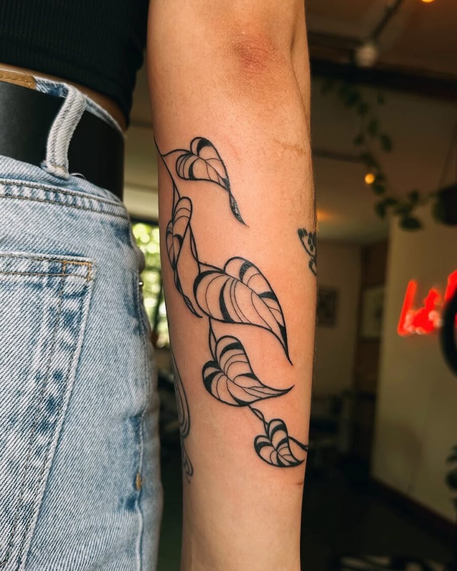 Elegant floral peace tattoo design on arm Tattoo on skin